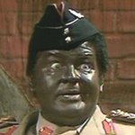 Benny as Idi Amin in 'The Bionic Baby'